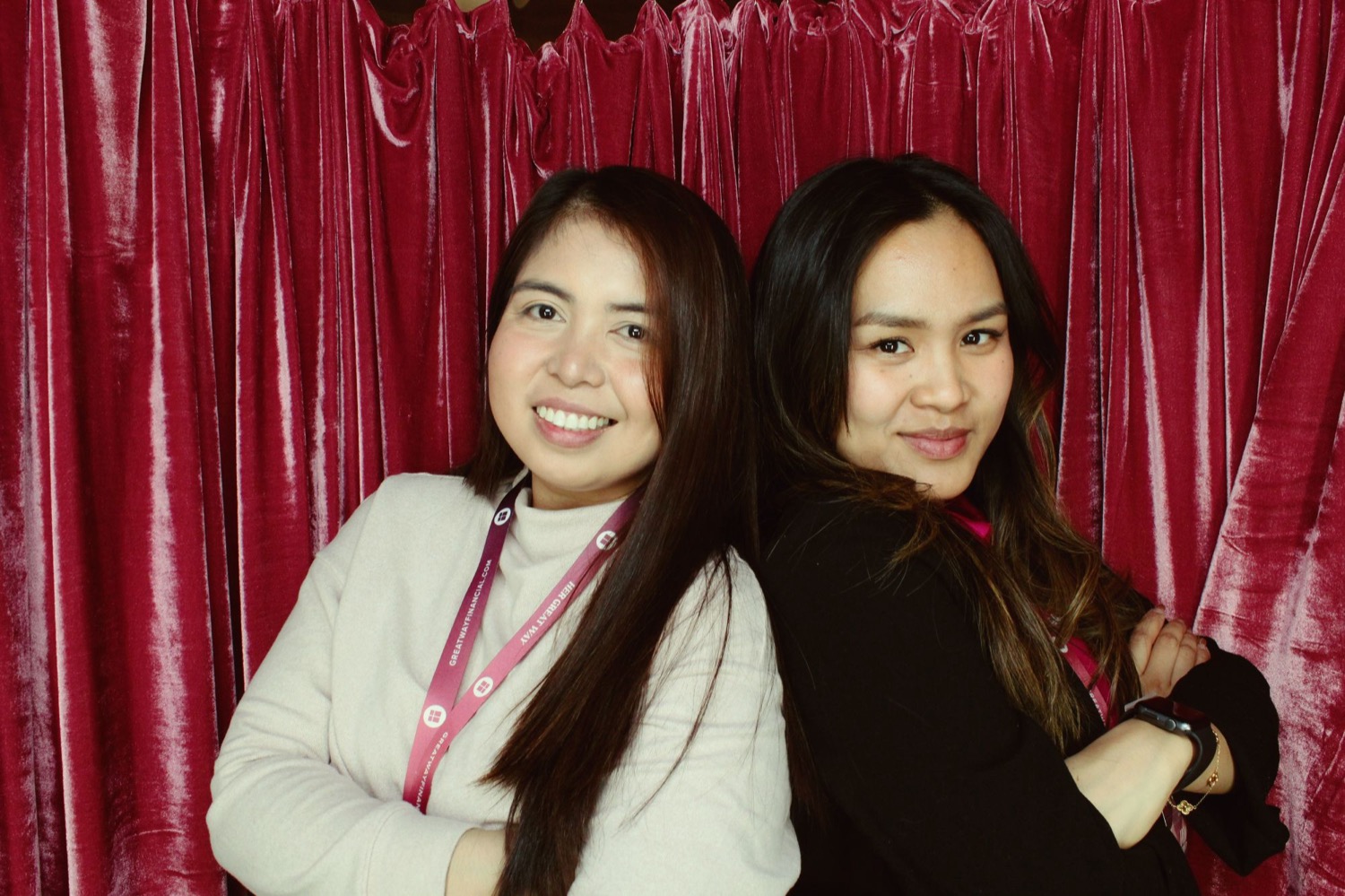 Club Citrine founders Clair Colcol and Ramonette Cañadilla, standing back to back in front of a deep red velvet backdrop