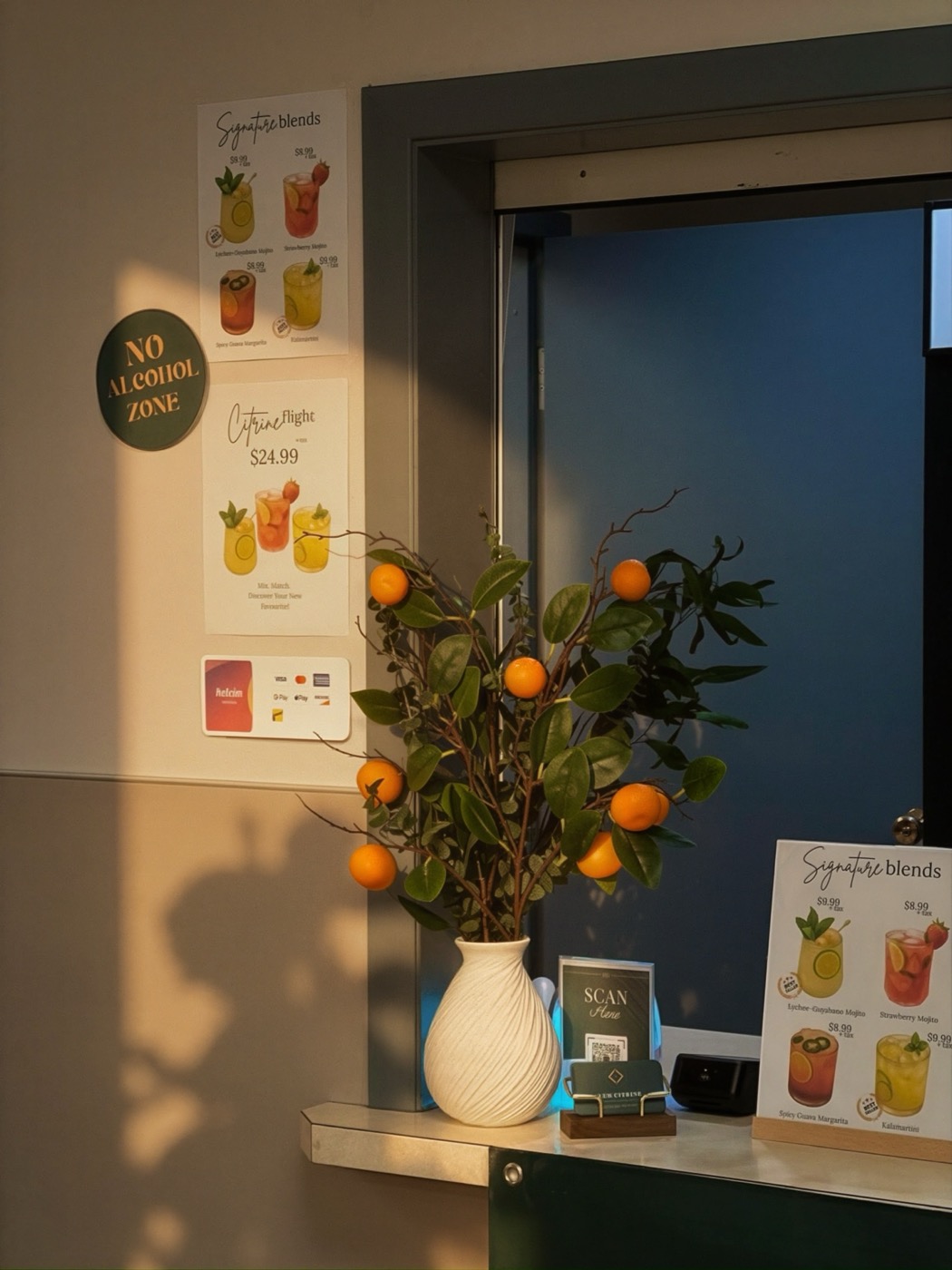 The Club Citrine menu board and bar setup in warm afternoon light.